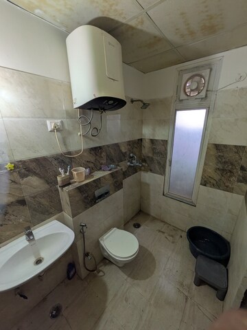 Bathroom in 3 BHK Apartment at Indosam75, Sector 75 – for Rent