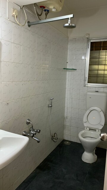 Bathroom in 2 BHK Apartment at Kumar Urban Kubera Colony, Kondhwa – for Rent