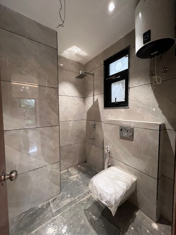 Bathroom in 4 BHK Builder Floor at Dlf Phase I – for Rent