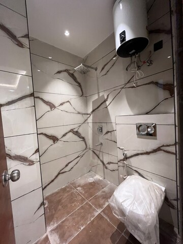 Bathroom in 4 BHK Builder Floor at Dlf Phase I – for Rent