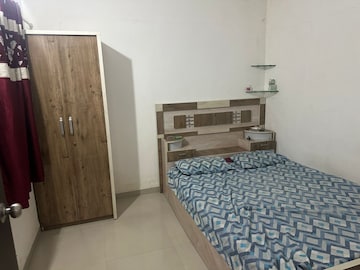 Bedroom in 1 BHK Apartment at Satyam Serenity, Wadgaon Sheri – for Rent