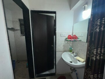 Bathroom in 1 BHK Apartment at Satyam Serenity, Wadgaon Sheri – for Rent