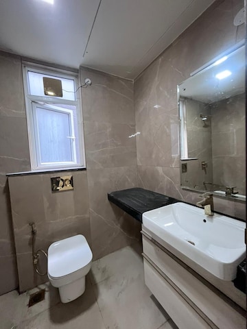 Bathroom in 3 BHK Apartment at Smart World Orchard, Sector 61 – for Rent