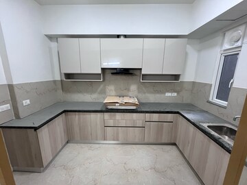 Kitchen in 3 BHK Apartment at Smart World Orchard, Sector 61 – for Rent