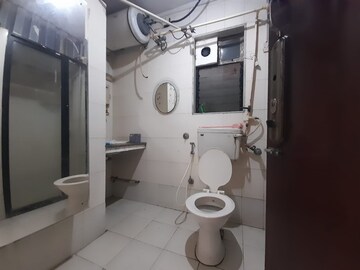 Bathroom in 3 BHK Apartment at Royal Palms, Goregaon East – for Rent