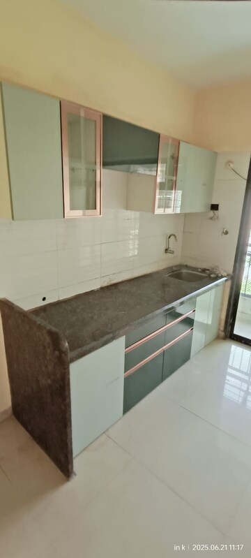 Kitchen in 2 BHK Apartment at Maitri Planet, Kharghar – for Rent