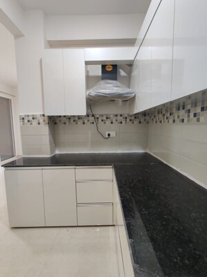 Kitchen in 2 BHK Apartment at Signature Global Orchard Avenue, Sector 93 – for Sale
