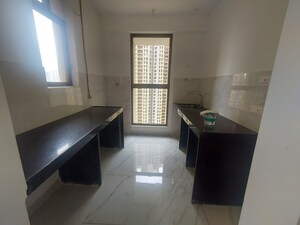 Kitchen in 1 BHK Apartment at Raymond Ten X Habitat, Pokhran Road No Two – for Sale