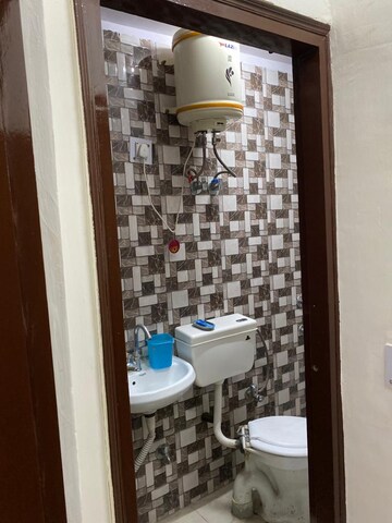 Bathroom in 1.5 BHK Builder Floor at Ansal Sushant Lok I, Sector 43 – for Rent