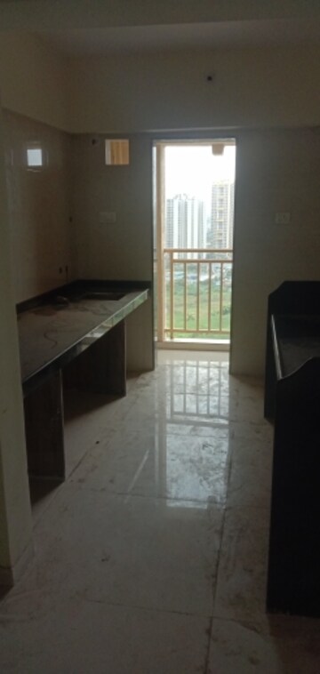 Kitchen in 1 BHK Apartment at Uma Elements, Daighar Gaon – for Rent