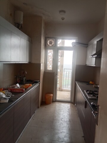 Kitchen in 4 BHK Apartment at Conscient Heritage Max, Sector 102 – for Rent