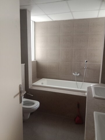 Bathroom in 4 BHK Apartment at Conscient Heritage Max, Sector 102 – for Rent