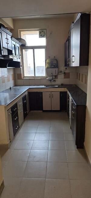 Kitchen in 3 BHK Apartment at Ashiana Palm Court, Raj Nagar Extension – for Sale