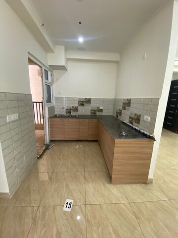 Kitchen in 2.5 BHK Apartment at Gaur Yamuna City, Gaur Yamuna City – for Rent