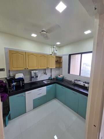 Kitchen in 2 BHK Apartment at Ashok Avenue Marol, Marol – for Rent