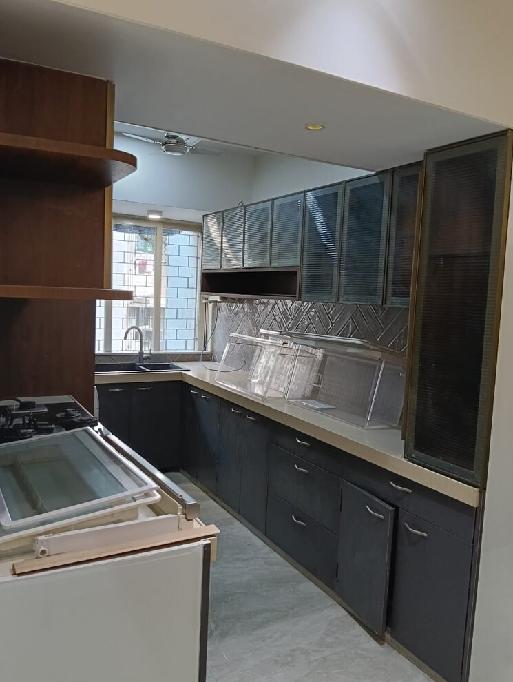 Kitchen, silver-mist-chs 2 Bedroom 960 Sq.Ft. Apartment In Versova Mumbai 8969528
