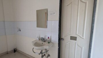Bathroom in 2 BHK Apartment at Sudhir Mandke Advantage CHS, Lulla Nagar – for Rent