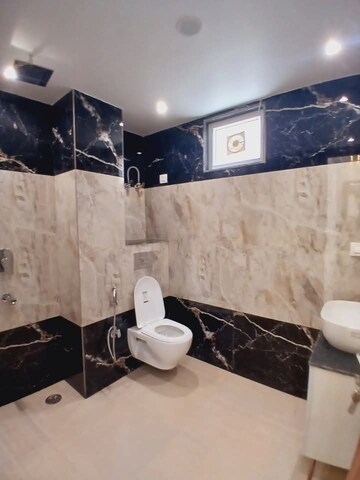 Bathroom in 4 BHK Apartment at Igi Airport Area – for Sale