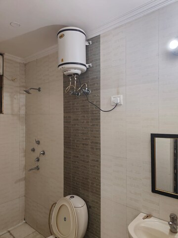 Bathroom in 3 BHK Apartment at Karanvir Towers, Sector 52 – for Rent