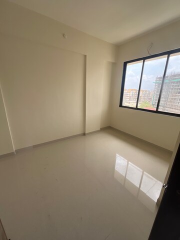 Room in 2 BHK Apartment at Shree Sai Kulswamini, Shirgaon – for Sale