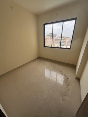 Room in 2 BHK Apartment at Shree Sai Kulswamini, Shirgaon – for Sale