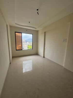 Room in 2 BHK Apartment at Shree Sai Kulswamini, Shirgaon – for Sale