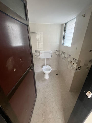 Bathroom in 2 BHK Apartment at Shree Sai Kulswamini, Shirgaon – for Sale