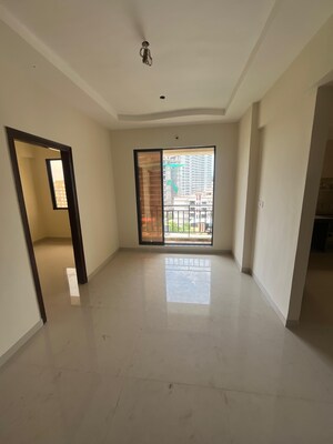 Room in 2 BHK Apartment at Shree Sai Kulswamini, Shirgaon – for Sale