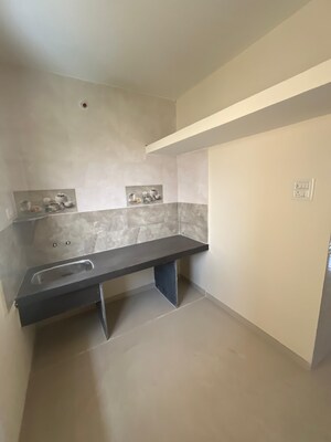 Kitchen in 2 BHK Apartment at Shree Sai Kulswamini, Shirgaon – for Sale