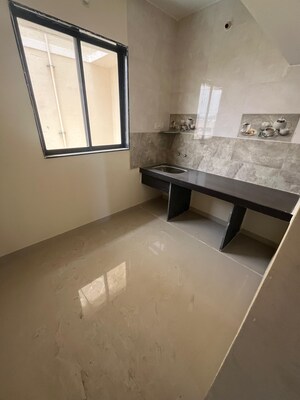 Kitchen in 2 BHK Apartment at Shree Sai Kulswamini, Shirgaon – for Sale