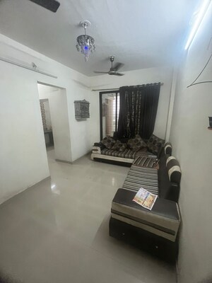 Living Room in 1 BHK Apartment at Dalal Vasant Springwoods, Ambernath – for Sale