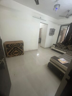 Living Room in 1 BHK Apartment at Dalal Vasant Springwoods, Ambernath – for Sale