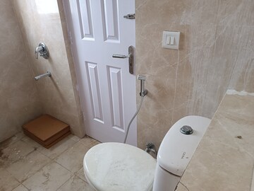 Bathroom in 3 BHK Apartment at Amrapali Heartbeat City, Sector 107 – for Sale