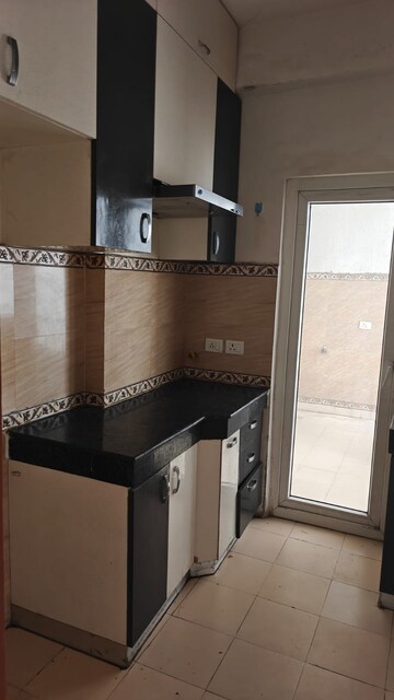 Kitchen in 3 BHK Builder Floor at Prateek Wisteria, Sector 77 – for Rent