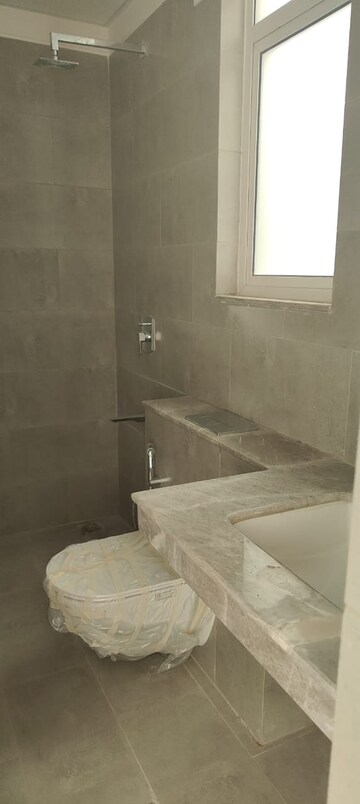 Bathroom in 4 BHK Apartment at Adani Samsara Vilasa, Sector 63 – for Rent