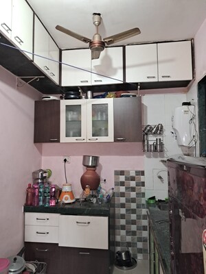 Kitchen in 2 BHK Apartment at Kopar Khairane – for Sale