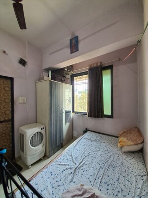 Living Room in 2 BHK Apartment at Kopar Khairane – for Sale