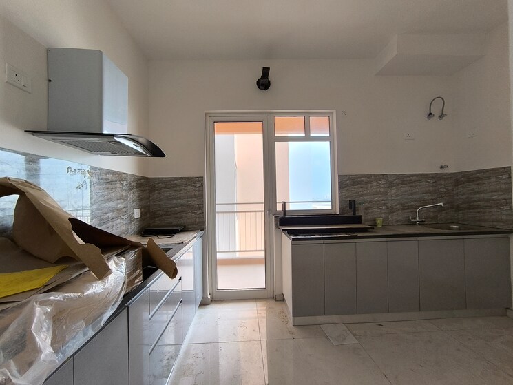 Kitchen, shapoorji-pallonji-joyville-phase-2 3 Bedroom 1692 Sq.Ft. Apartment In Sector 102 Gurgaon 8969982