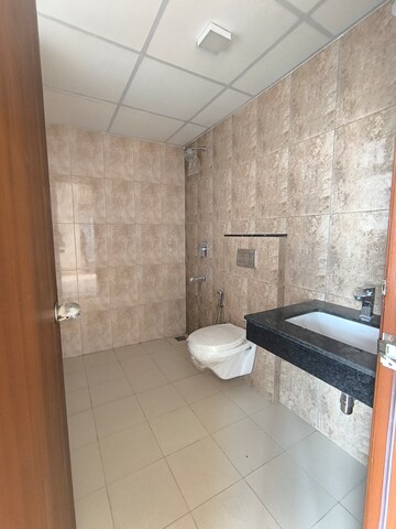 Bathroom in 3 BHK Apartment at Shapoorji Pallonji Joyville Phase 2, Sector 102 – for Rent