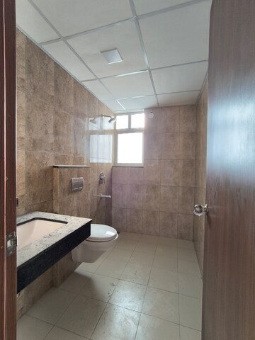 Bathroom in 3 BHK Apartment at Shapoorji Pallonji Joyville Phase 2, Sector 102 – for Rent