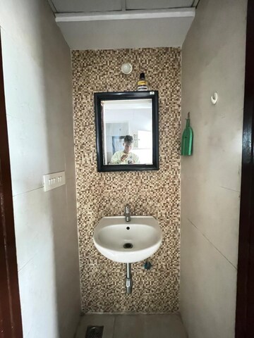 Bathroom in 1 BHK Apartment at Lodha Lakeshore Greens, Dombivli East – for Sale