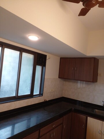 Kitchen in 2 BHK Apartment at Saturn Apartment, Bandra West – for Rent
