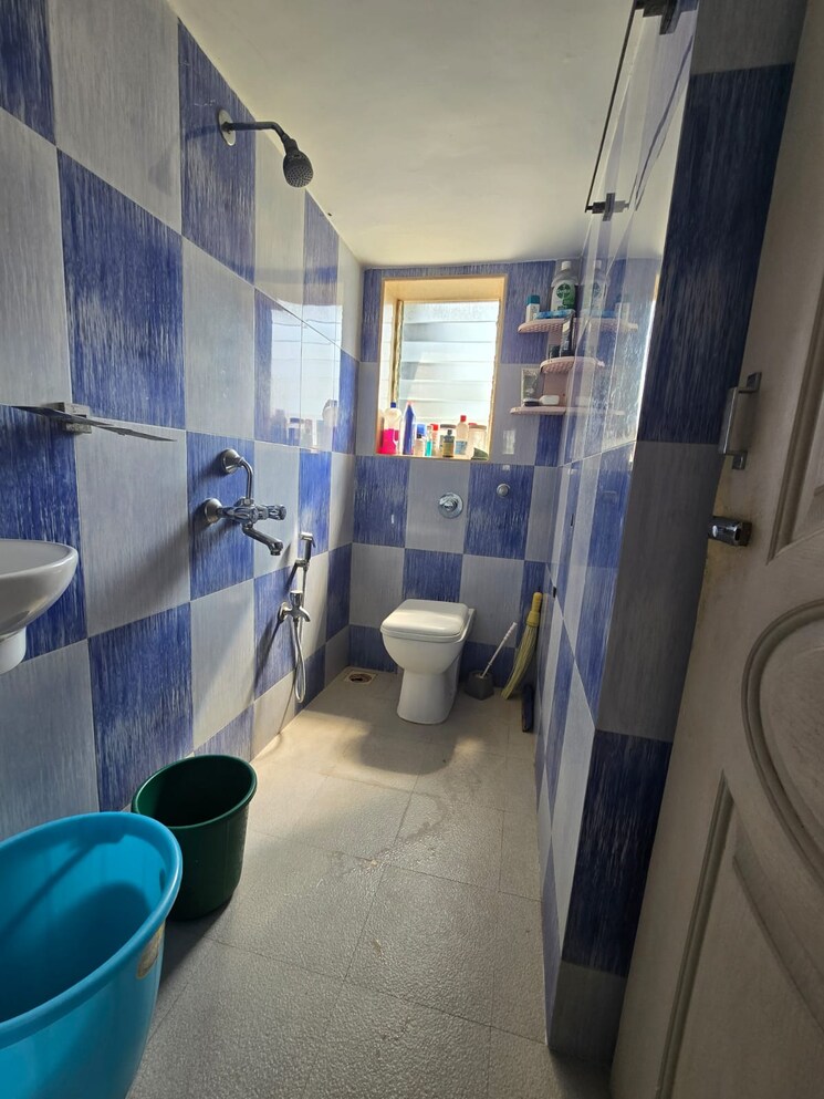 Bathroom, universal-chs 2 Bedroom 650 Sq.Ft. Apartment In Bandra West Mumbai 8970153