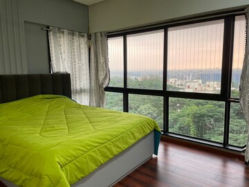 Bedroom in 2 BHK Apartment at Kanakia Rainforest, Andheri East – for Rent