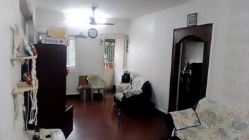 Living Room in 1 BHK Apartment at Lokpuram CHS, Vasant Vihar – for Rent