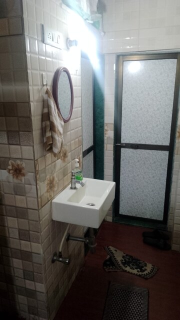 Bathroom in 1 BHK Apartment at Lokpuram CHS, Vasant Vihar – for Rent