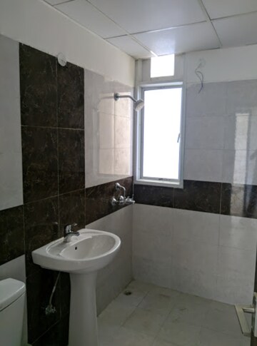 Bathroom in 3 BHK Apartment at ATS Happy Trails, Sector 10 Greater Noida – for Sale
