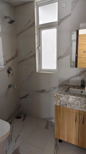 Bathroom in 2 BHK Builder Floor at M3M Soulitude, Sector 89 – for Sale