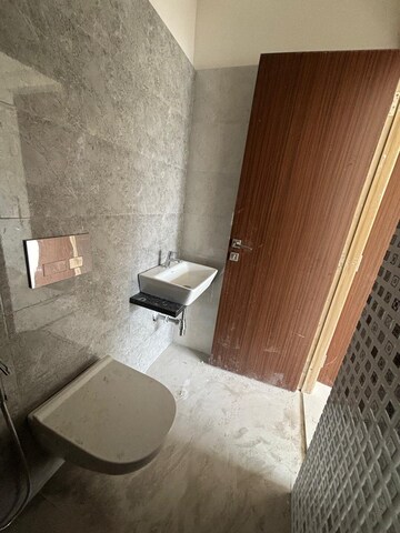 Bathroom in 1 BHK Apartment at Omkar Signet, Malad East – for Rent