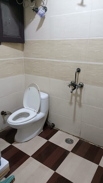Bathroom in 3 BHK Builder Floor at Vasundhara Sector 1 – for Sale